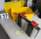 small parts bins and hardware plus sandpaper in yellow plastic bin
