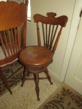 oak swivel piano stool with back