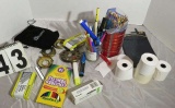 mixed office supplies and desk items