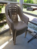 group of 4 plastic arm chairs