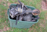 tote of used solar powered yard lights