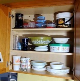 contents of upper kitchen cabinet plates, cups, plastic ware