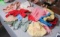 box of assorted doll clothes