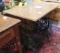 Repurposed travel sewing machine base with marble top