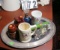 Silverplated serving tray, insulators, candle, 2 cups, picture frame, lantern, miniature ceramic bas