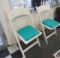 wood folding chairs with turquoise cushion seats