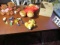 Mixed plush toys, pooh bear, teddy precious, Sonny and Cher, small action figures, wood crate