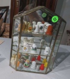 24 piece thimble collection in small show case