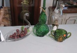 green glass bowl, glass swan, green bud vase, oil chimney lamp