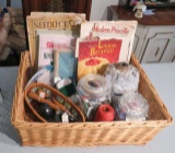 woven reed basket with recipe and needlecraft books and sewing crafts
