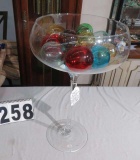 party size champaign glass filled with14 handblown glass balls