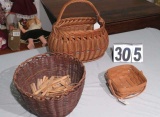 Longaberger basket and two other baskets  one filled with clothespins