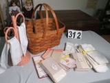 picnic basket and linens  wicker towel rack