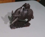 carved wood water buffalo with glass eye