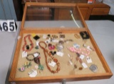 display case loaded with 30 pieces costume jewelry
