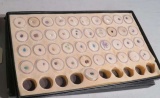 assorted gemstones in assortment tray