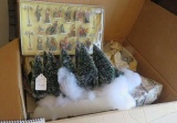 box of Christmas ornaments and small figurines