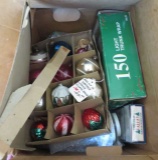 box of Christmas lights and ornaments