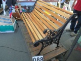 wrought iron and wood park bench