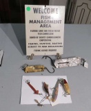 vintage fishing lures and metal fish management area sign