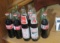 assorted coke bottles (3) Bear Bryant and (4) Nascar and other mixed 11 bottles total