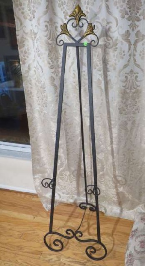 wrought iron easel with fleurets design  64" high