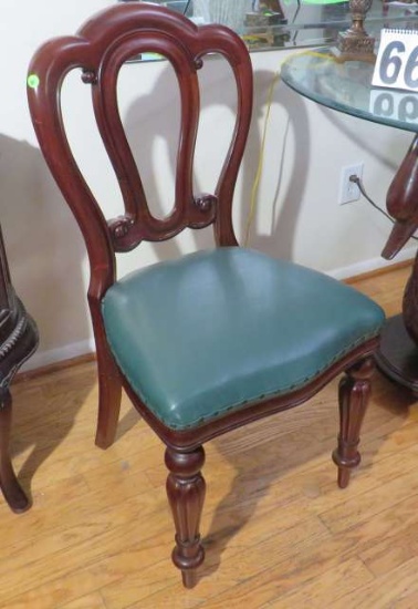 walnut dining chairs on casters with green upholstered seat cushions