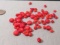 group of 60 round drilled red coral discs  Various sizes