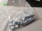 package of 41 round blue dotted white glass beads