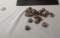 package of 21 black blue donut style assorted glass beads