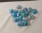 package of 17 turquoise with pink white raised design glass beads