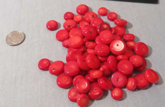 group of 50 round drilled red coral discs  Various sizes