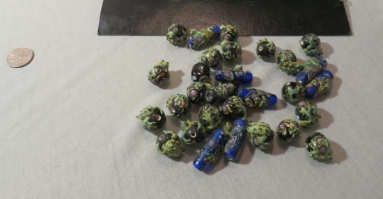 package of 29 round frog on a log green brown black blue glass beads