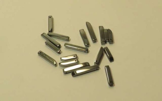 pack of 18 Hematite, Drilled Dark grey Elongated Smooth stones
