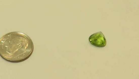Peridot Green, medium Trillion Faceted 9mm x 9mm 2.27cts