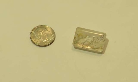 Quartz Clear with dendrites Emerald cut 21.5mm x 14.0mm 21.06cts