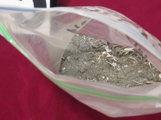 bag of 14k gold and sterling silver bench dust 154.9 grams net weight