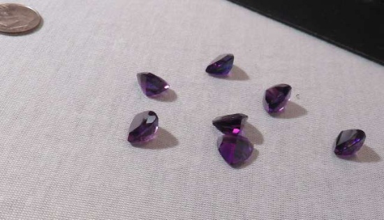 Amethyst Trillion Faceted 11.00mm 3.99cts avg.