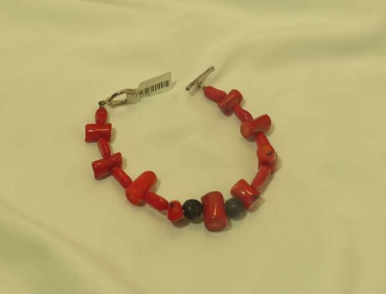7 1/2" bracelet - enhanced coral & lava beads w/sterling toggle clasp