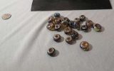 package of 21 black blue donut style assorted glass beads