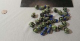 package of 29 round frog on a log green brown black blue glass beads