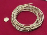 coils of mixed .925 wire weight 157.4 grams