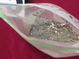 bag of 14k gold and sterling silver bench dust 154.9 grams net weight