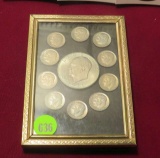 framed 1971 Ike dollar surrounded by 10 Roosevelt dimes 1967-1970
