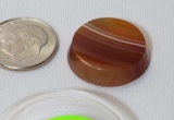 orange white banded  polished disk agate 19mm diameter