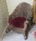 ornately carved mahogany parlor chair