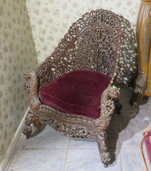 ornately carved mahogany parlor chair