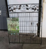 pair of hinged panels of metal fencing system