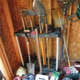 rack with assorted yard tools