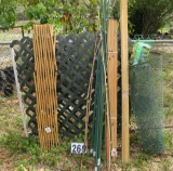 trellis fencing , stakes, and plastic growing mesh